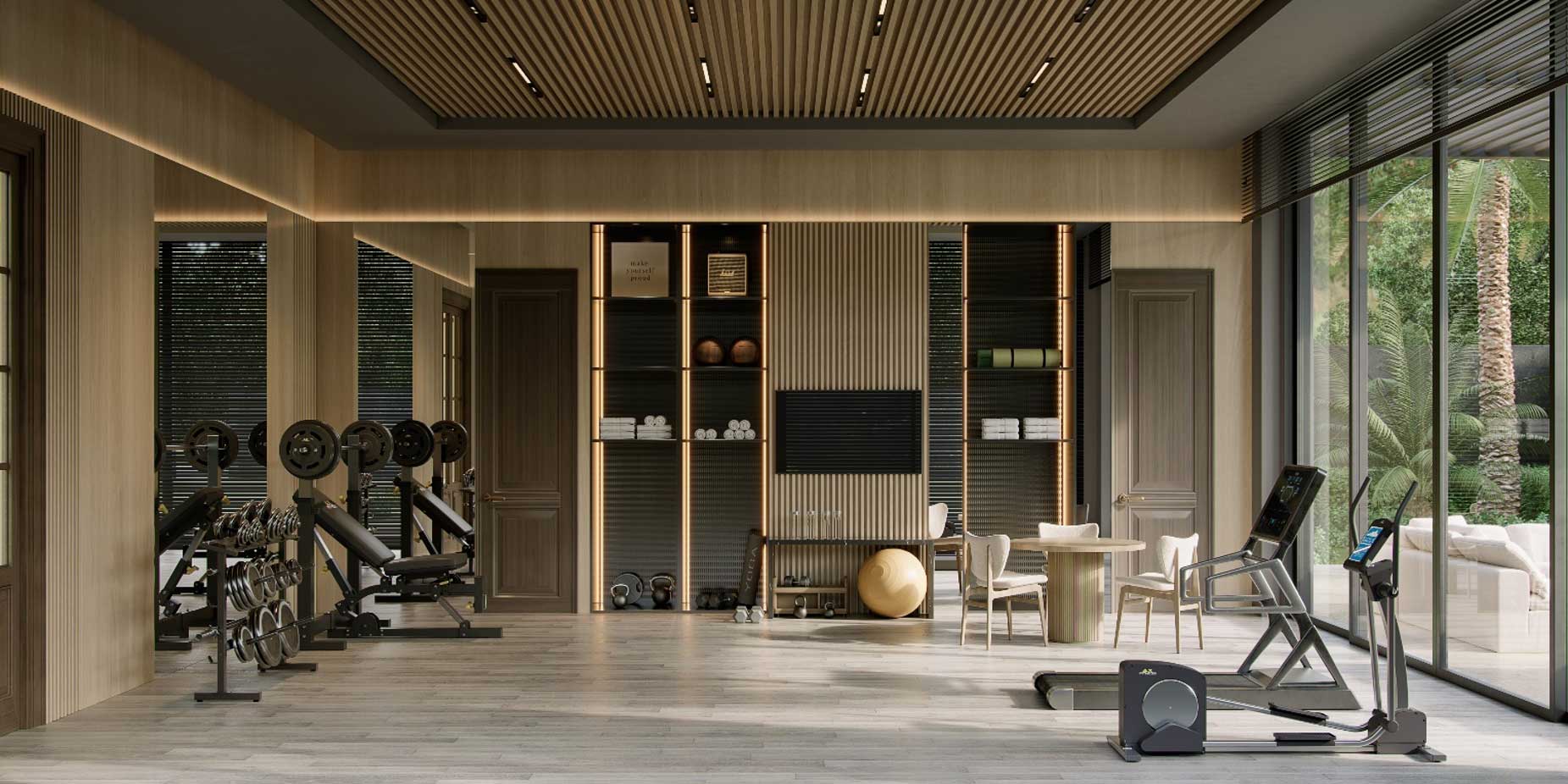 Private home gym in a Dubai villa with full-height glazing, impact-absorbing floor and connection to a shaded terrace