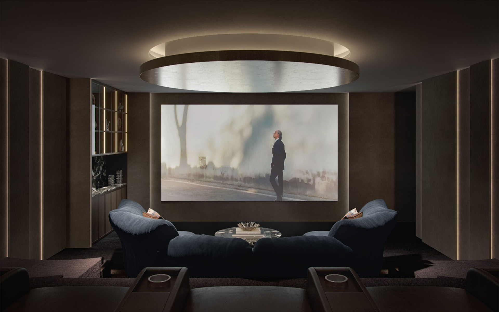 Section drawing through a private cinema showing tiered seating risers, seated eye levels and screen
        height relationship